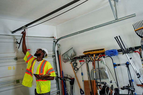 Professional Garage Door Panel Replacement technician working in Calhoun City, MS